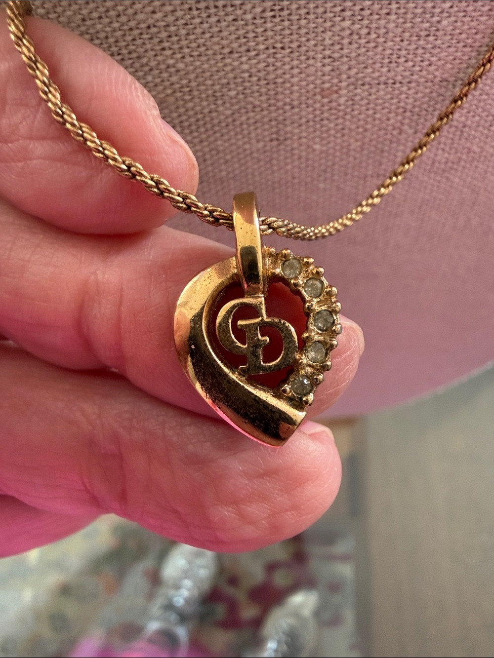 Christian Dior Vintage GoldTone Necklace With Heart Shaped Logo Pendant.